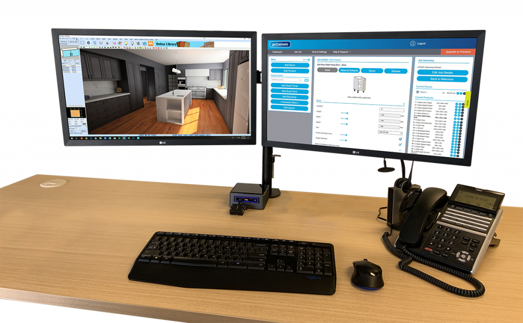 desktop double screen set up, with phone